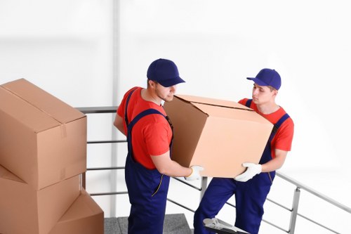 Packed boxes and office items ready for transport during a relocation
