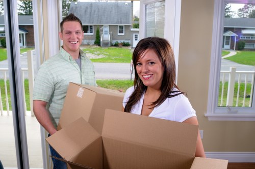 Man and van removals team helping with a residential move in North Woolwich