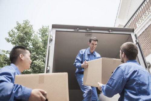 Removal crew protecting property with careful moving practices