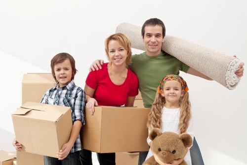 Loading household items into a van for a North Woolwich move