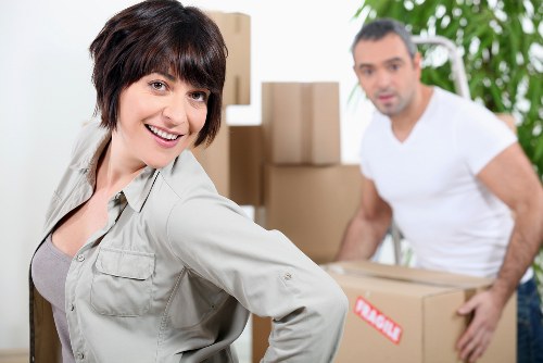 Worker checking items and preparing for transport